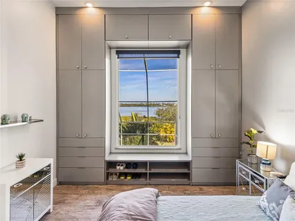 a view of a swimming pool with an outdoor seating