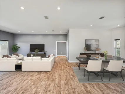 a kitchen with counter top space appliances and cabinets
