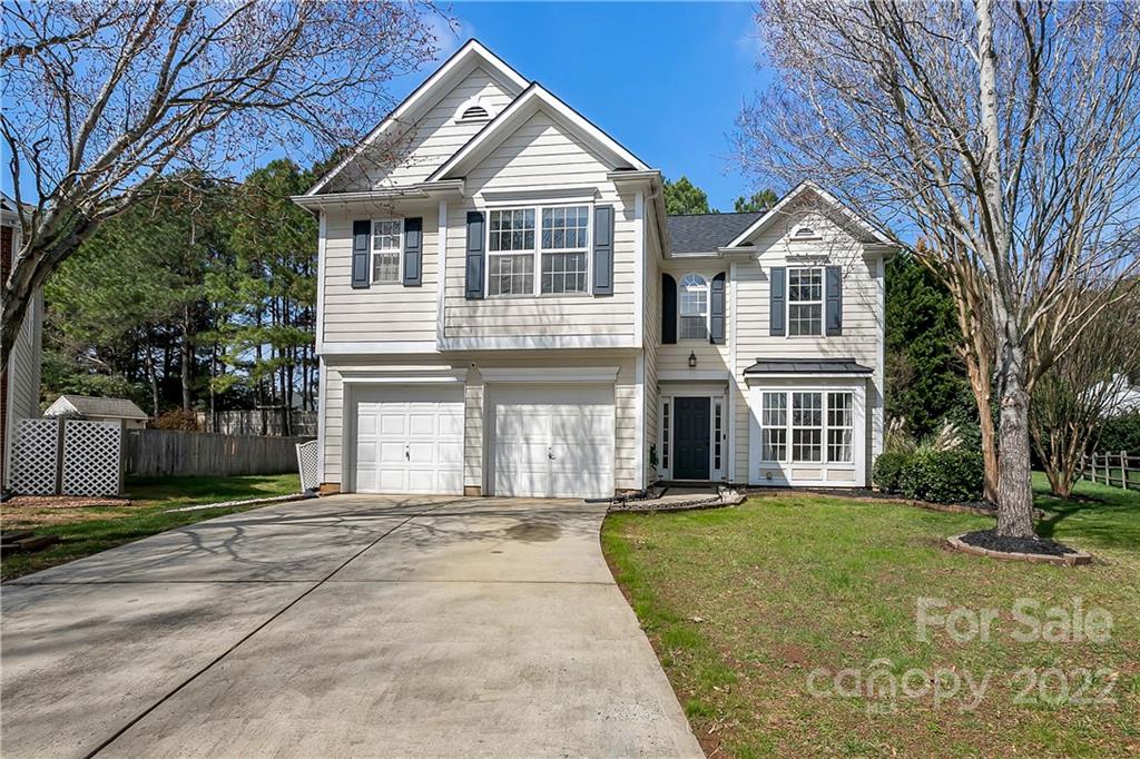7601 Silverton Way Huntersville, NC 28078 - Photo 1 of 26 a front view of a house with a yard