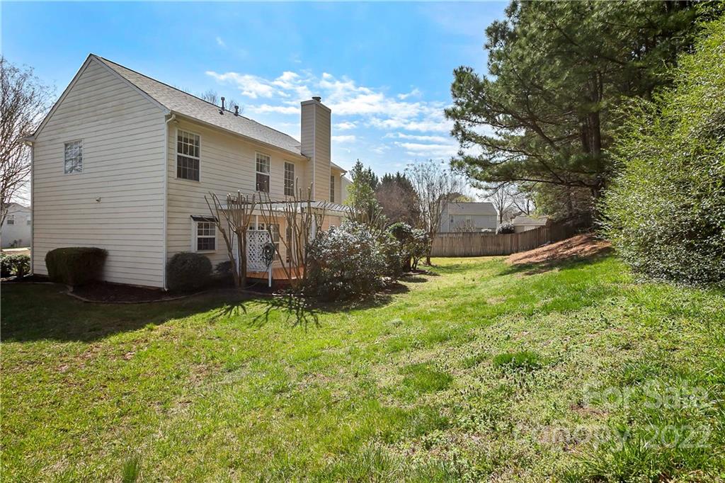 7601 Silverton Way Huntersville, NC 28078 - Photo 25 of 26 a view of a house with backyard and sitting area