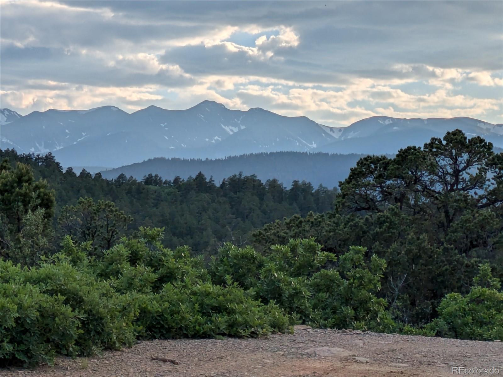 14341 Northridge Road Weston, CO 81091 - Photo 29 of 49 a view of a lake with mountains in the background