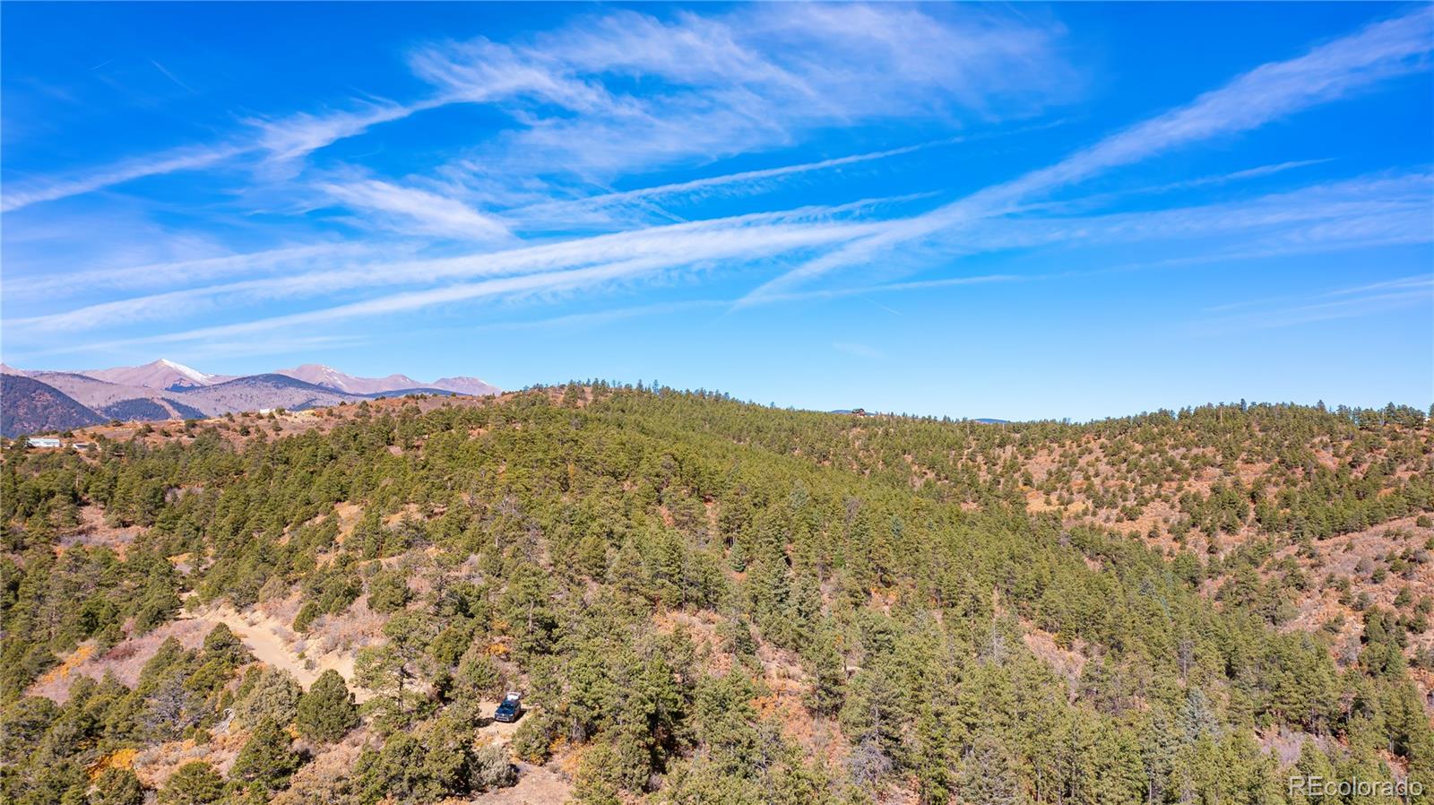 14341 Northridge Road Weston, CO 81091 - Photo 39 of 49 a view of a mountain range in a cloudy sky