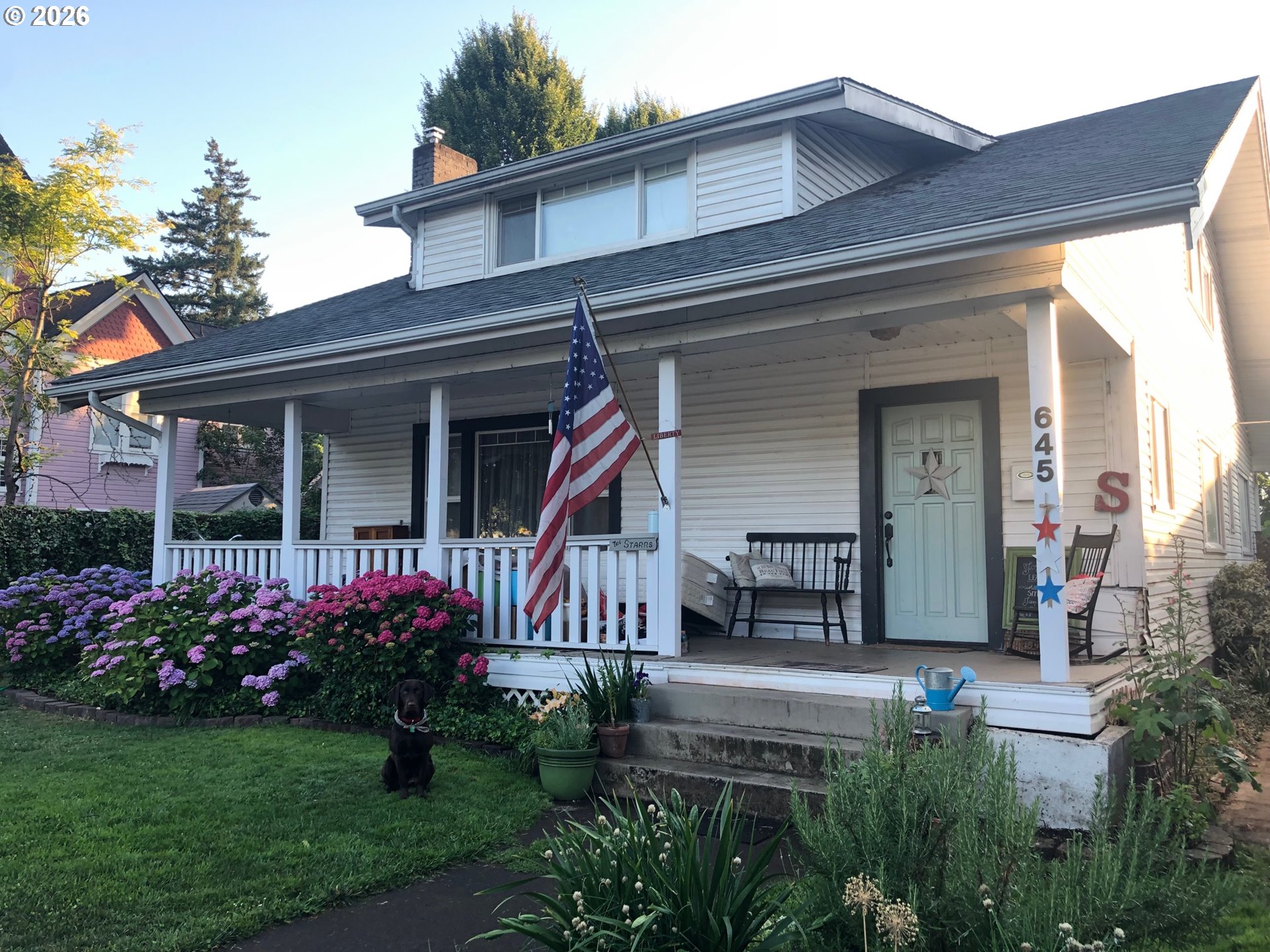 645 Juniper Street Junction City, OR 97448 - Photo 1 of 20 front view of a house with a small yard