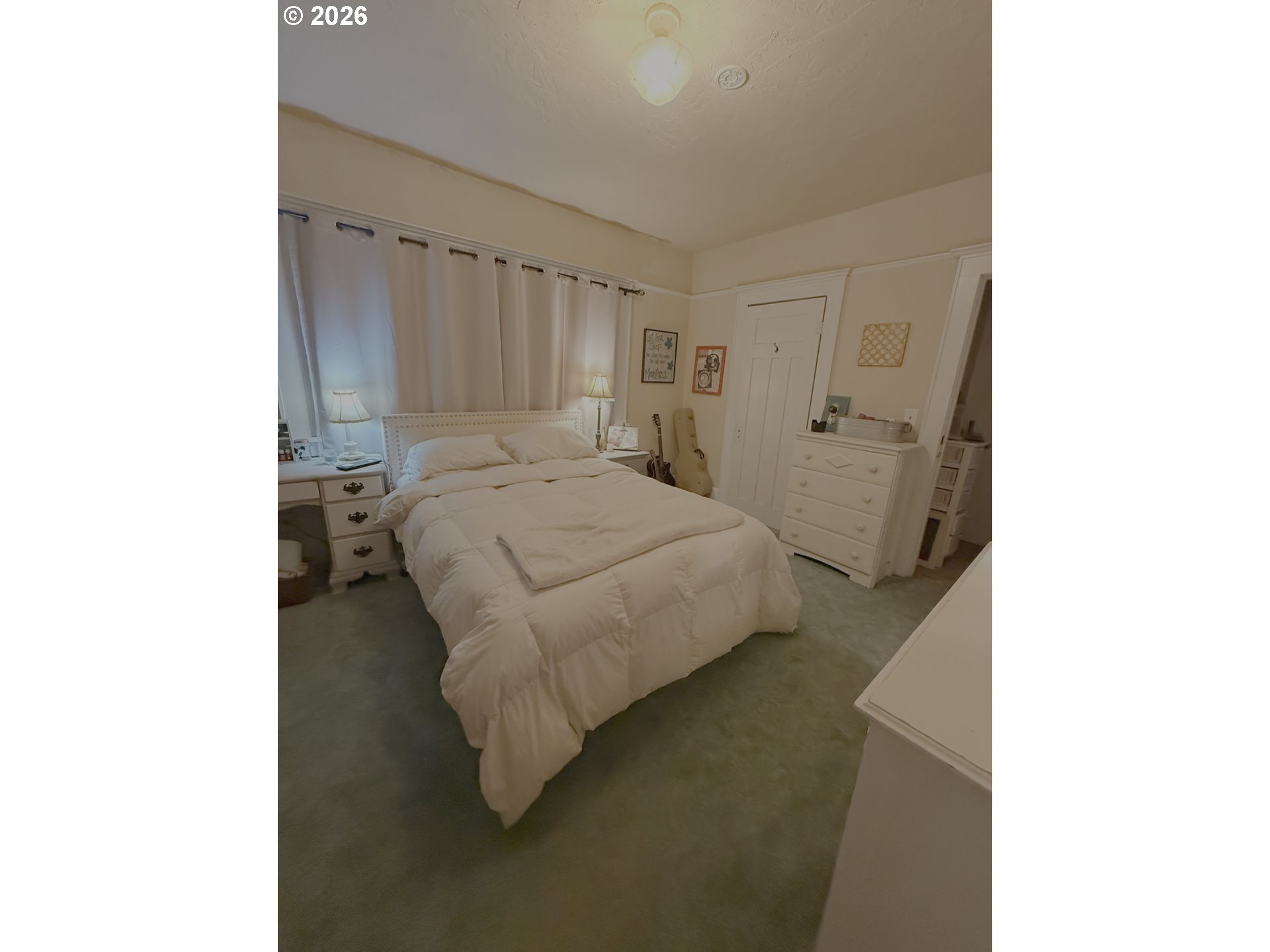 645 Juniper Street Junction City, OR 97448 - Photo 14 of 20 a bedroom with a bed and a window