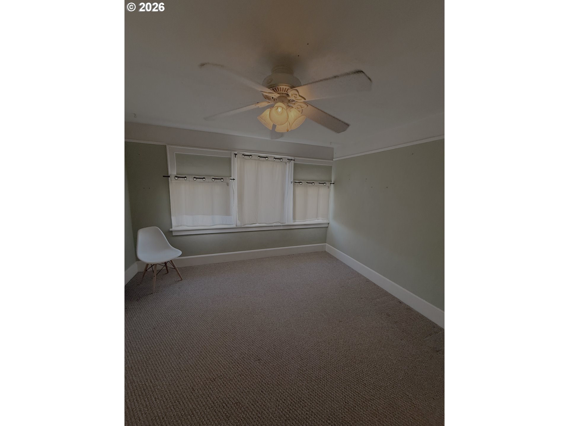 645 Juniper Street Junction City, OR 97448 - Photo 17 of 20 a view of empty room with ceiling fan