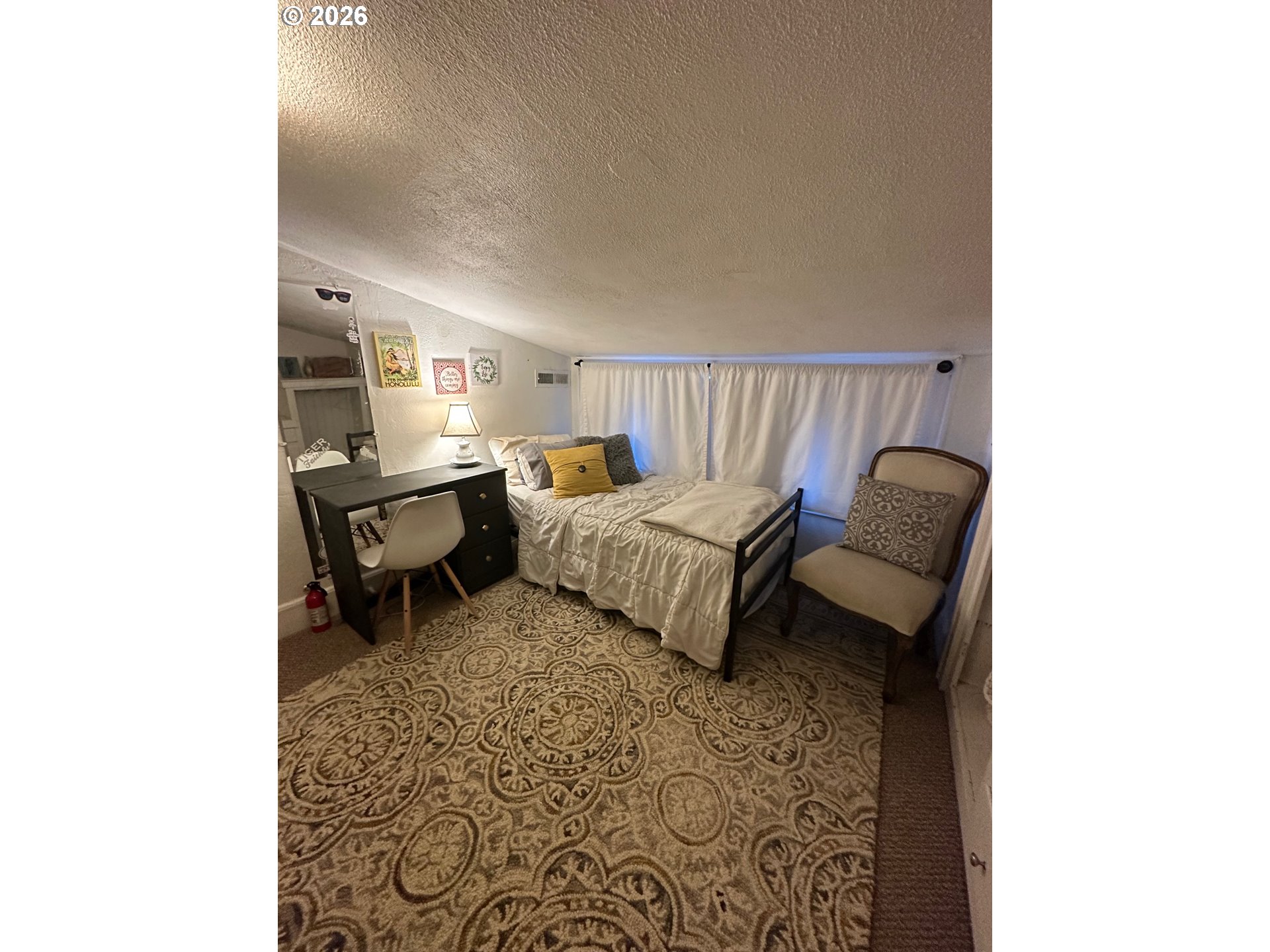 645 Juniper Street Junction City, OR 97448 - Photo 20 of 20 a living room with furniture and a rug