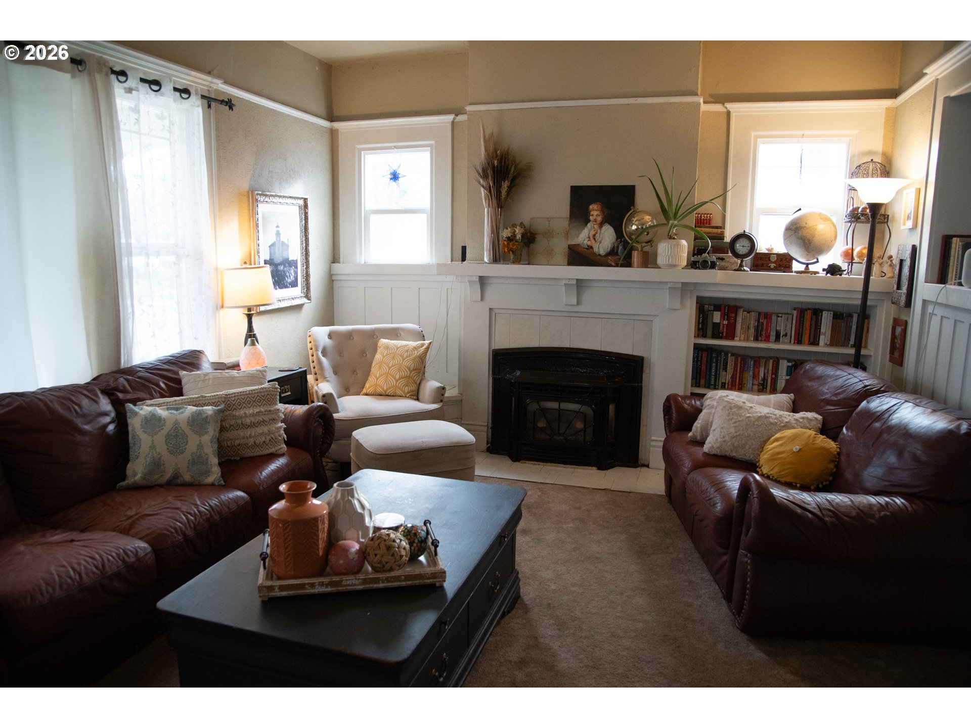 645 Juniper Street Junction City, OR 97448 - Photo 3 of 20 a living room with furniture and a fireplace