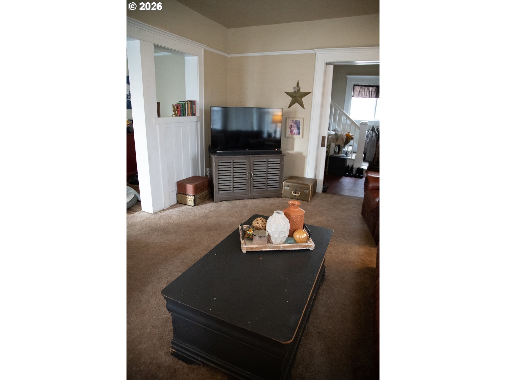 645 Juniper Street Junction City, OR 97448 - Photo 5 of 20 a living room with furniture and a flat screen tv