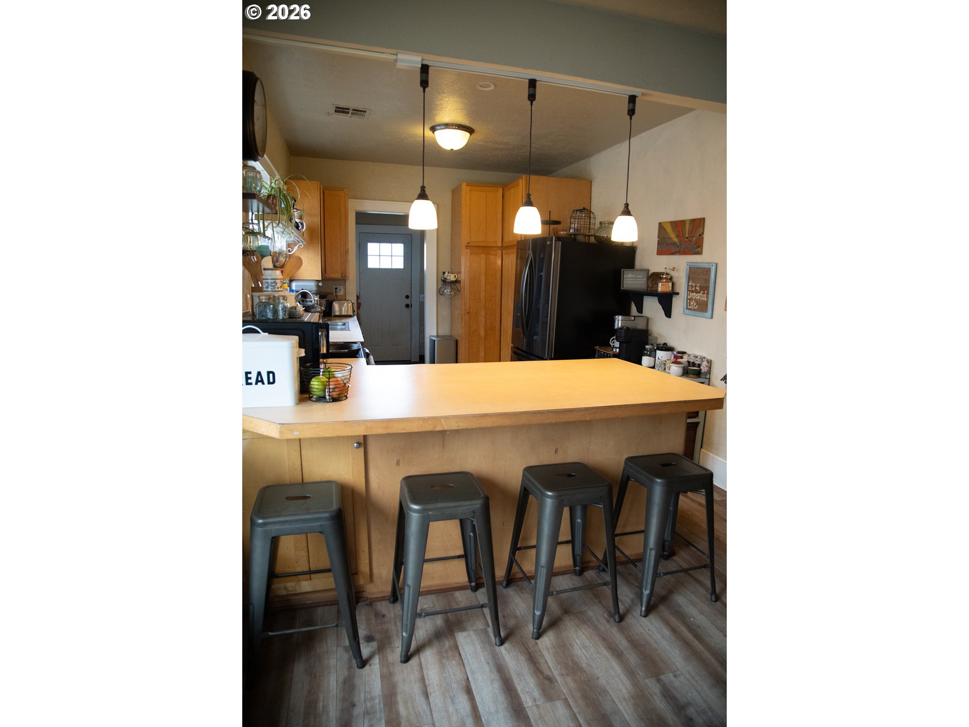 645 Juniper Street Junction City, OR 97448 - Photo 8 of 20 a dining room with a table and chairs