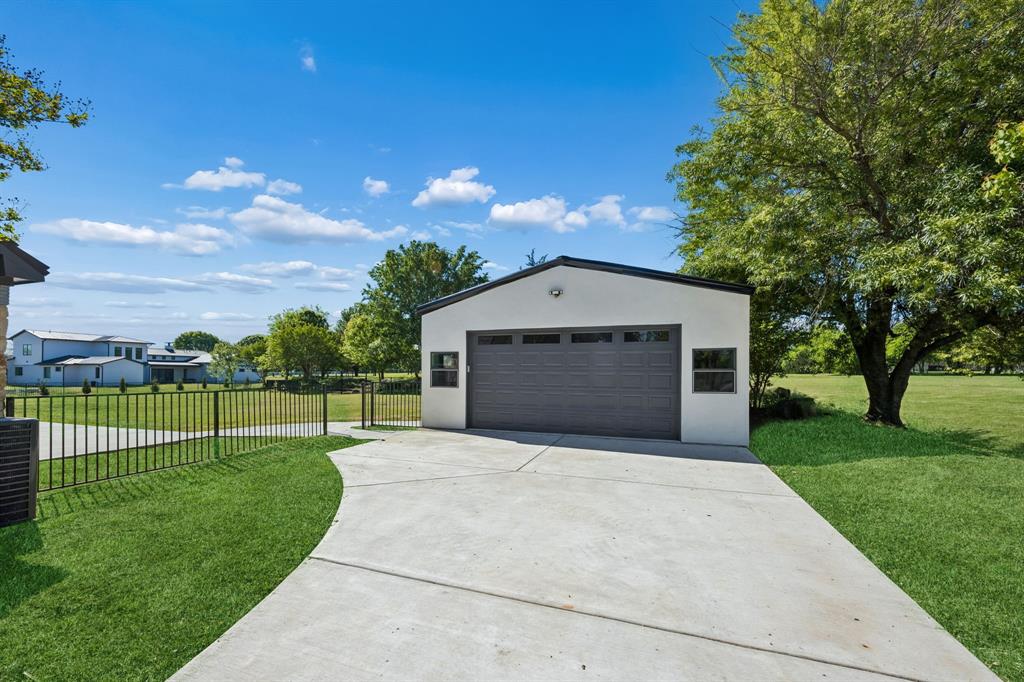 1260 Stacy Road Fairview, TX 75069 - Photo 35 of 40 Newly constructed garage is oversized with 23' of depth and a 12' tall doorframe