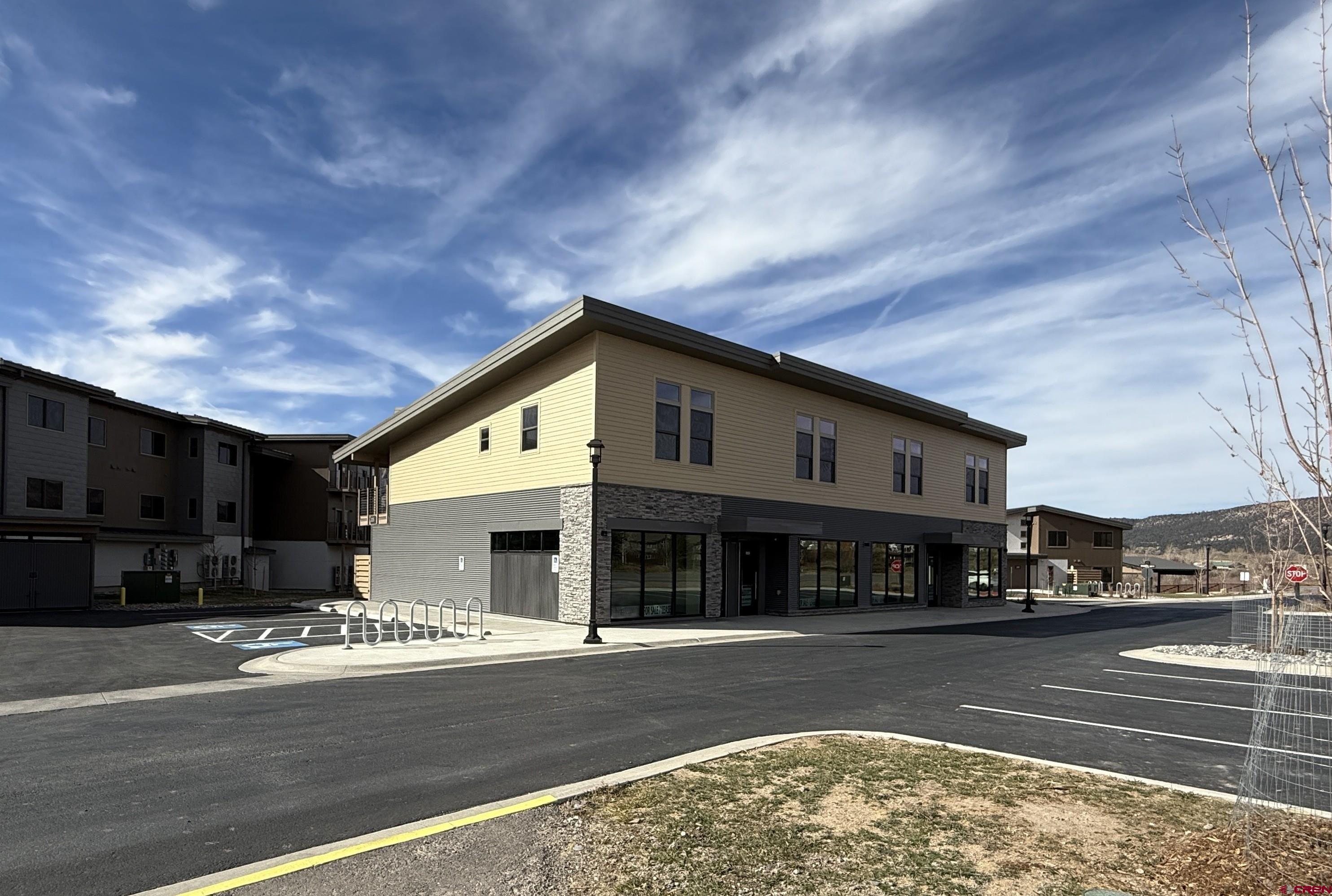 205 Jasper Lane, Unit 103 Ridgway, CO 81432 - Photo 3 of 28 a view of a food mall next to a road