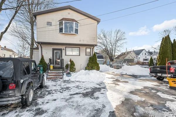 a view of a house with snow on the floor