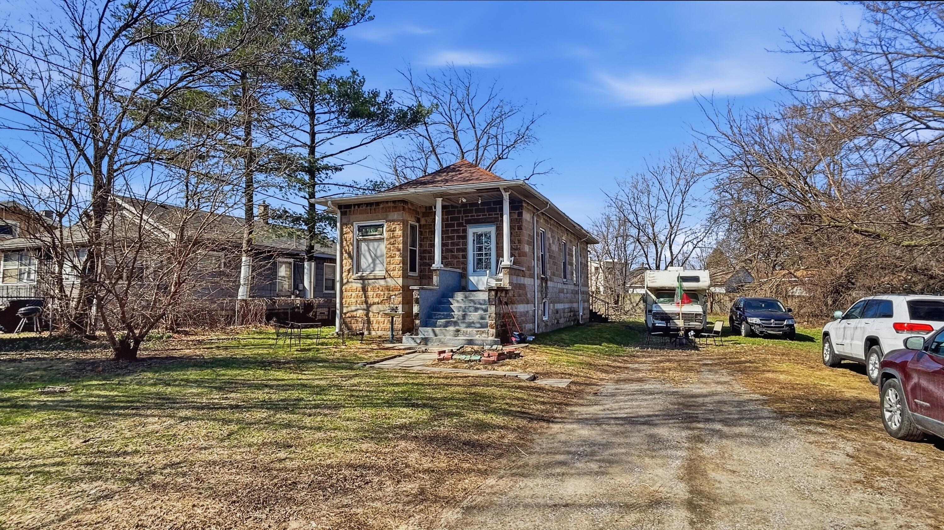 5210 Howard Avenue Hammond, IN 46320 - Photo 2 of 17 a view of a town with large trees