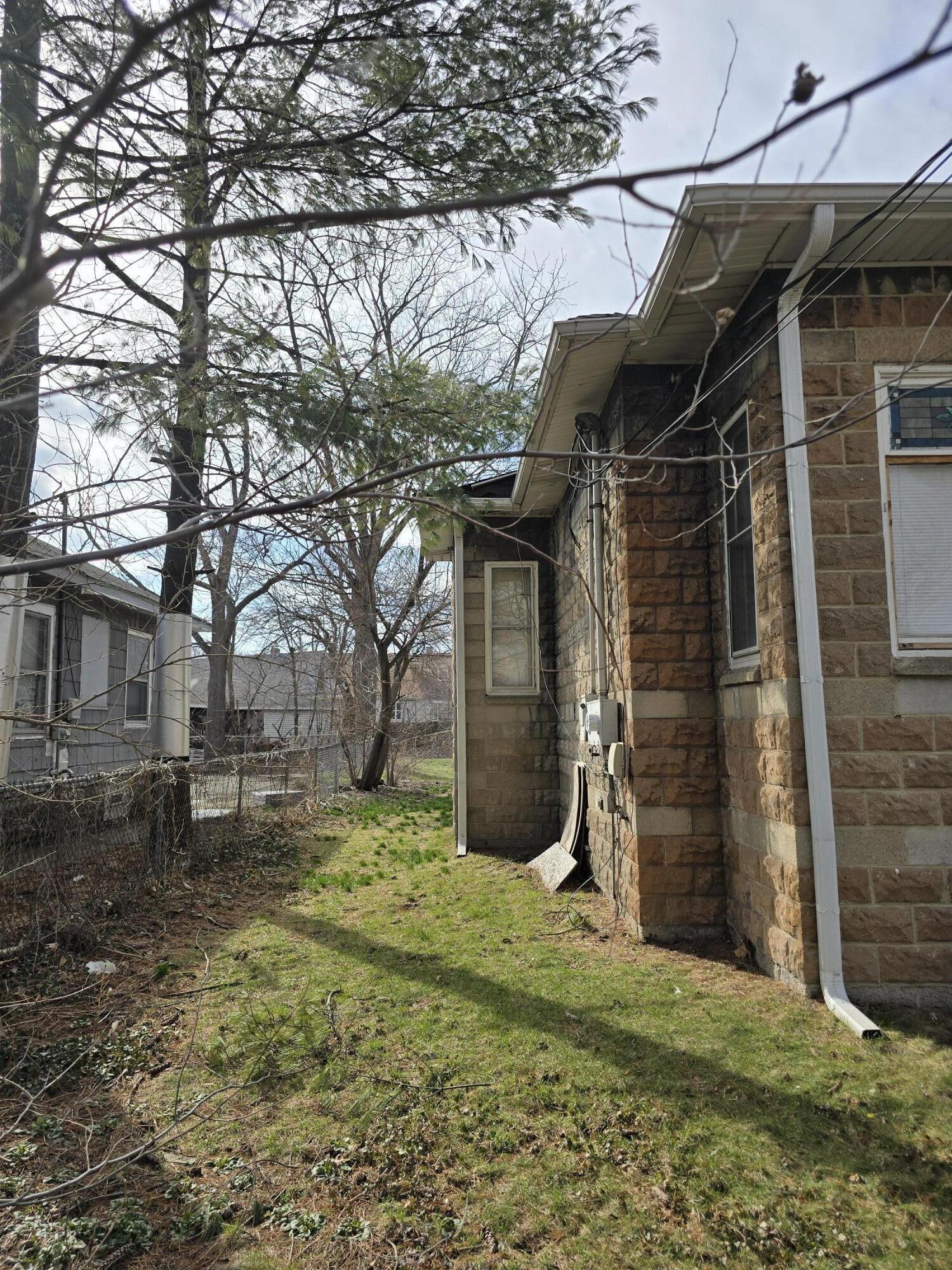 5210 Howard Avenue Hammond, IN 46320 - Photo 5 of 17 a view of a backyard of the house