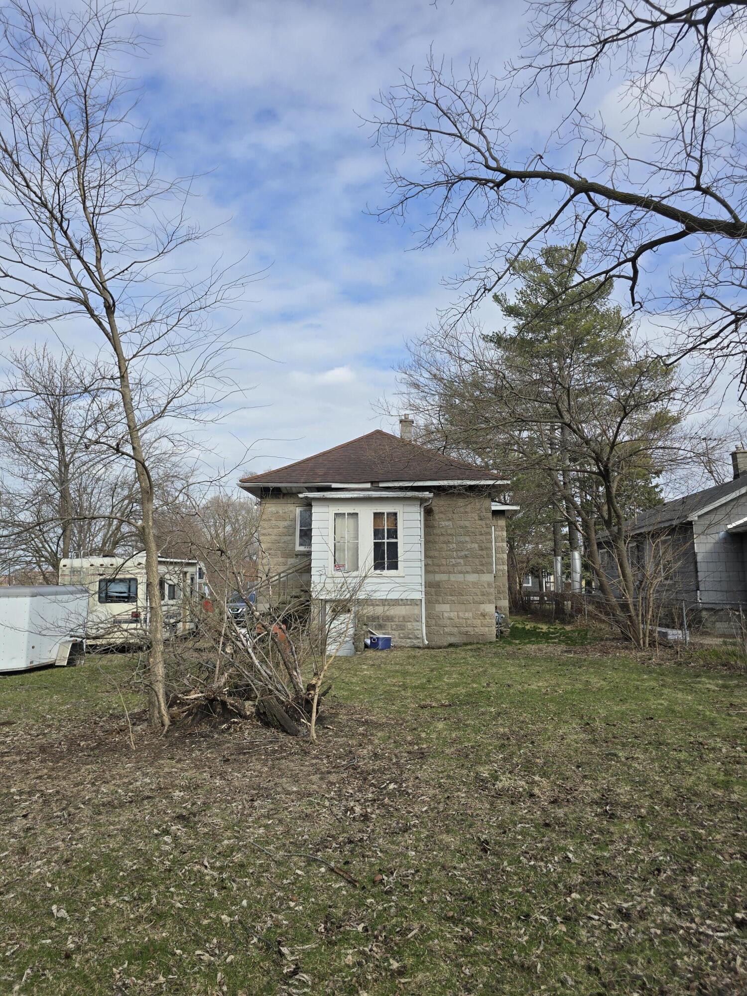5210 Howard Avenue Hammond, IN 46320 - Photo 6 of 17 a view of a house with a yard