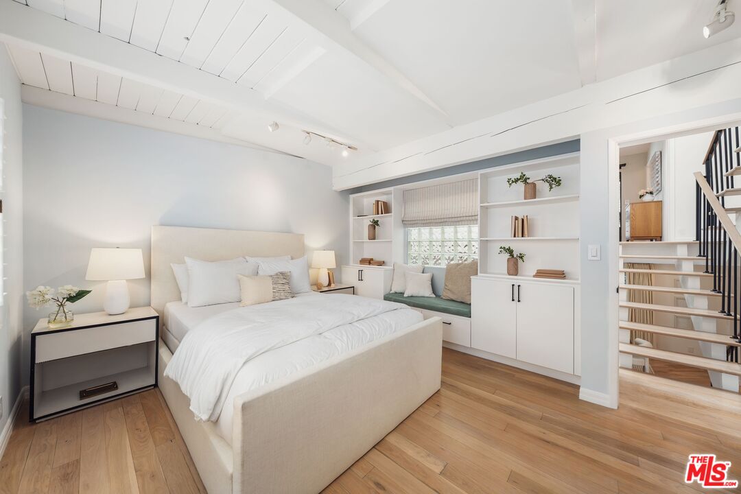 831 14th Street, Unit 2 Santa Monica, CA 90403 - Photo 21 of 32 a bedroom with a bed and a walk in closet