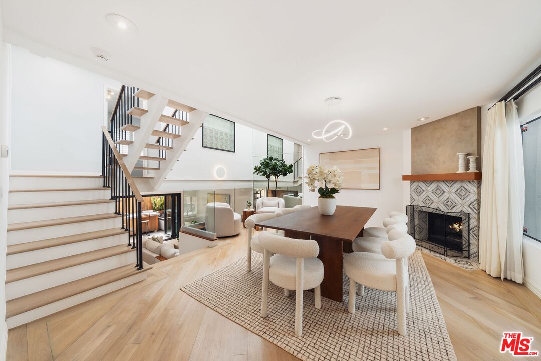 831 14th Street, Unit 2 Santa Monica, CA 90403 - Photo 6 of 32 a view of a livingroom with furniture and fireplace