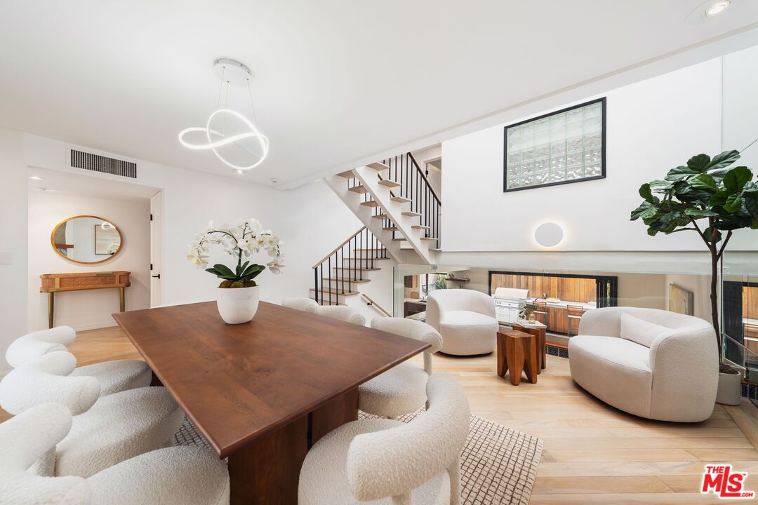 831 14th Street, Unit 2 Santa Monica, CA 90403 - Photo 7 of 32 a living room with furniture and wooden floor