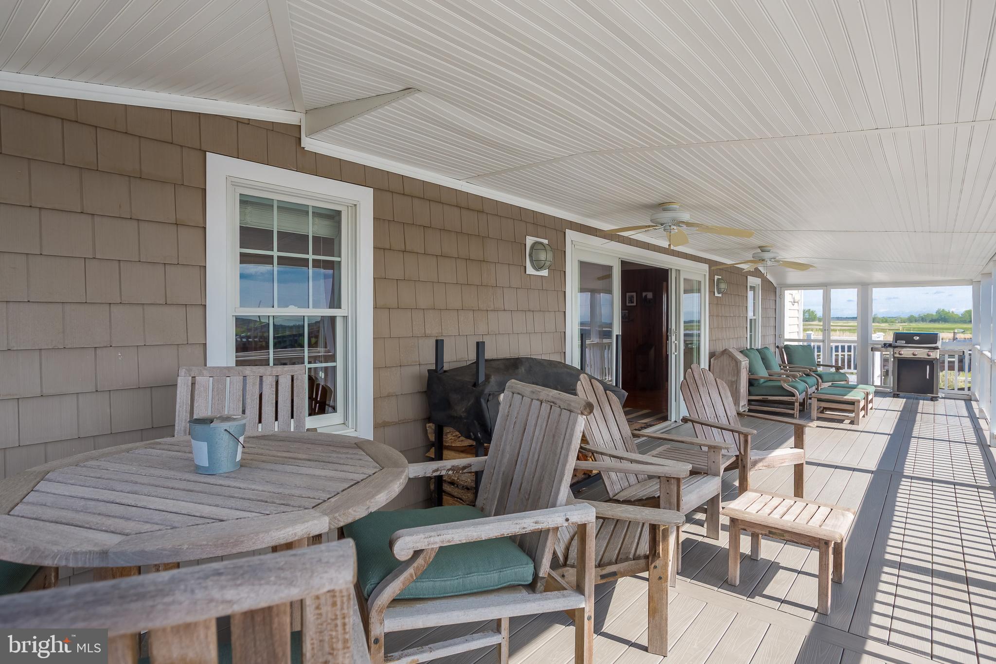 3706 Bestpitch Ferry Road Cambridge, MD 21613 - Photo 15 of 43 a view of a dining room with furniture