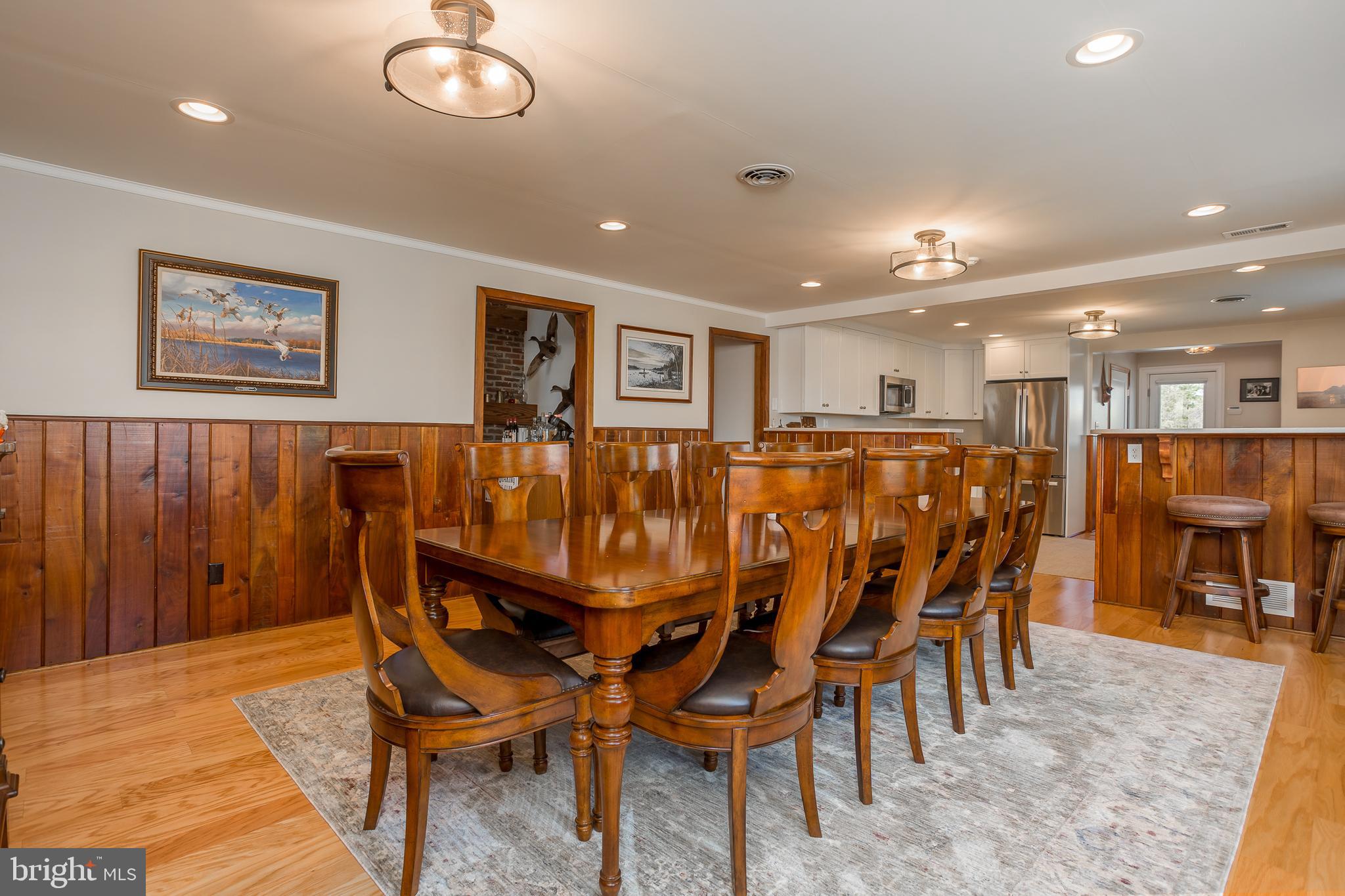 3706 Bestpitch Ferry Road Cambridge, MD 21613 - Photo 18 of 43 a view of a dining room with furniture
