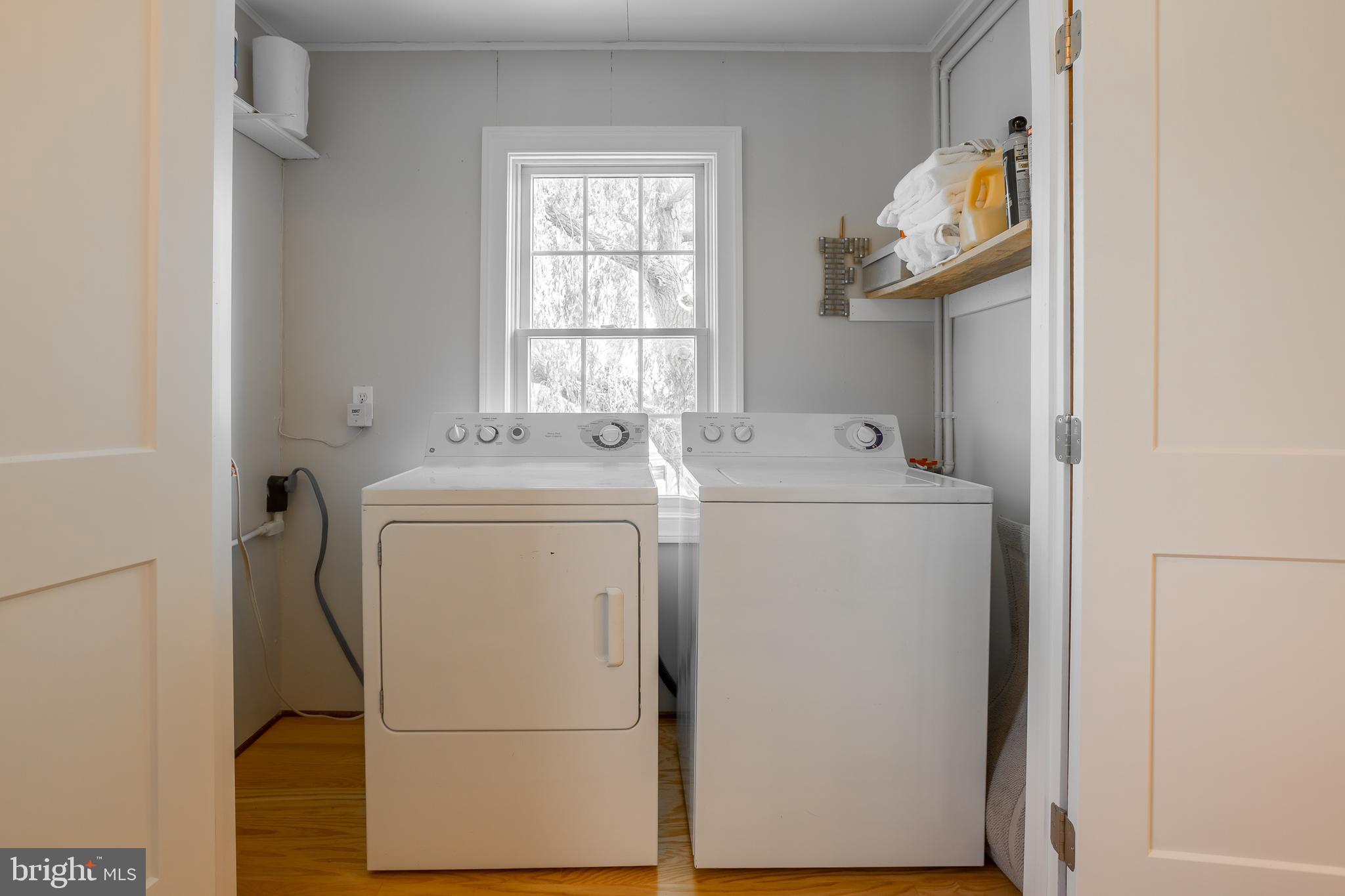 3706 Bestpitch Ferry Road Cambridge, MD 21613 - Photo 23 of 43 a utility room with dryer and washer