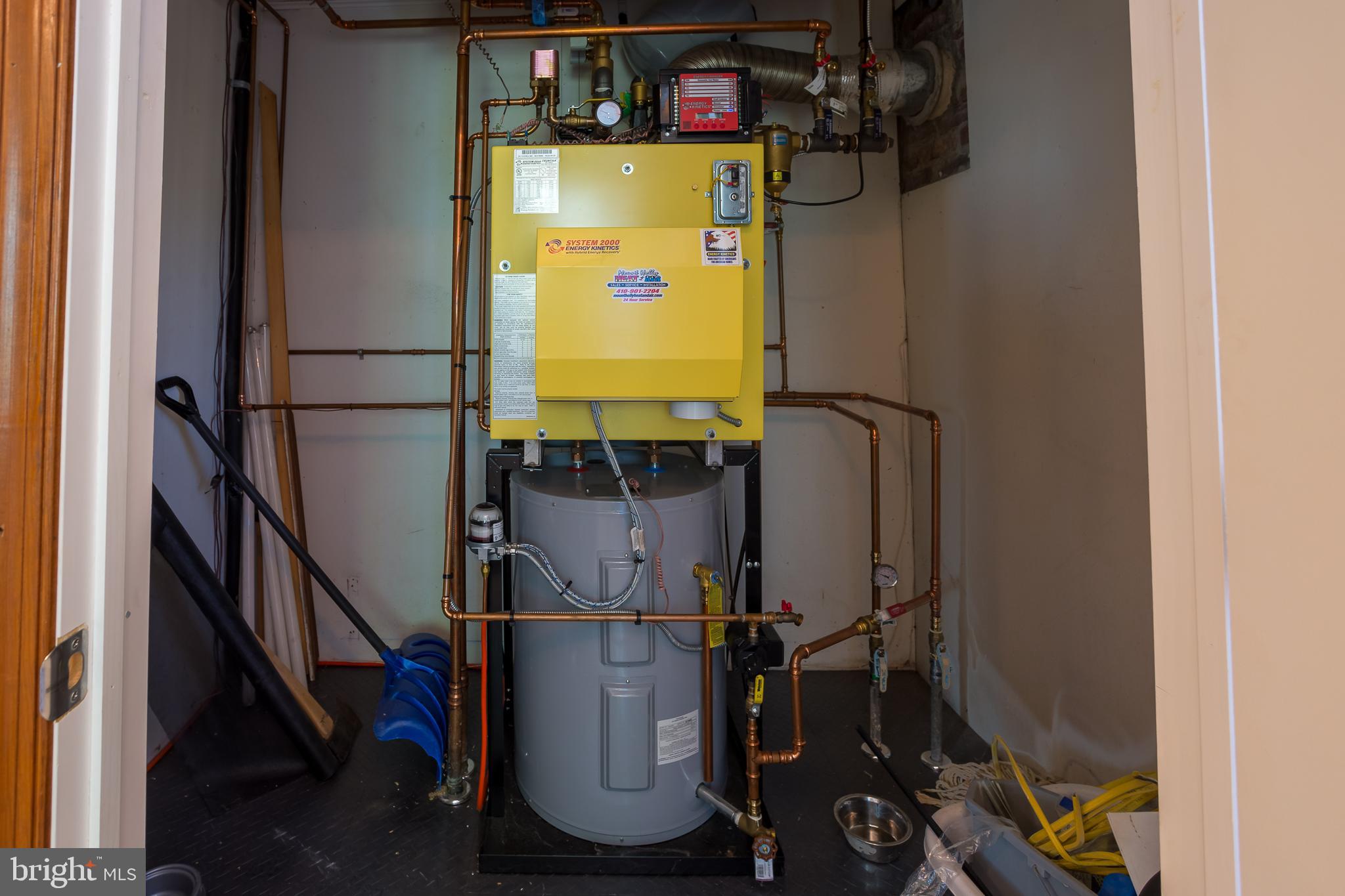 3706 Bestpitch Ferry Road Cambridge, MD 21613 - Photo 36 of 43 a room with water heater and stairs