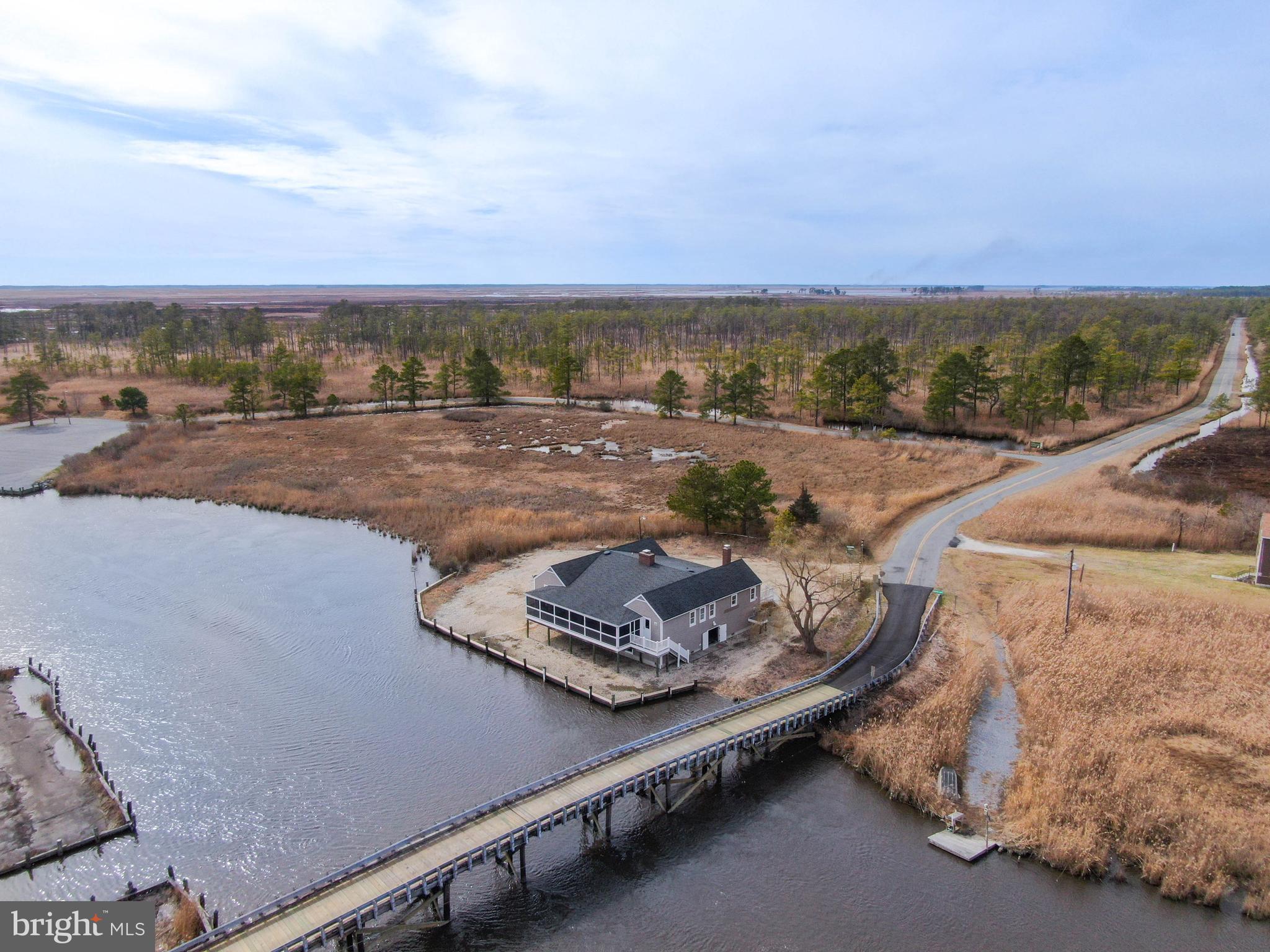 3706 Bestpitch Ferry Road Cambridge, MD 21613 - Photo 4 of 43 an aerial view of a residential houses with city view