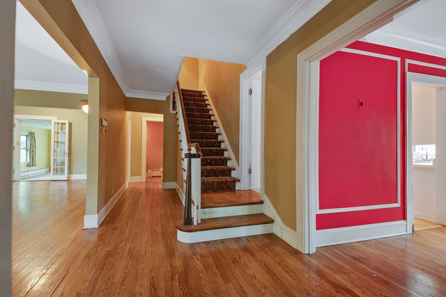 60 Sheridan Road Highland Park, IL 60035 - Photo 3 of 29 a view of front door with wooden floor and stairs