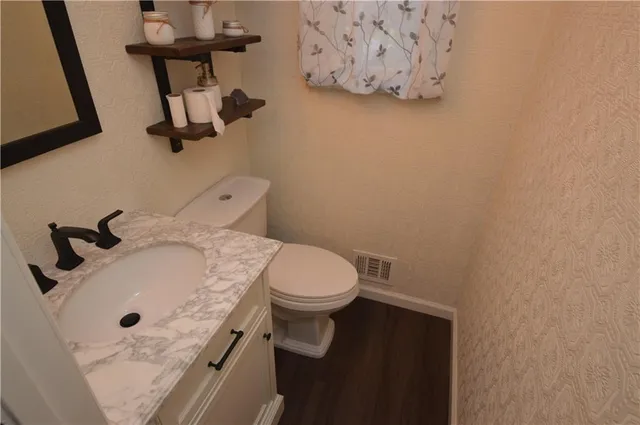 a bathroom with a sink and a toilet