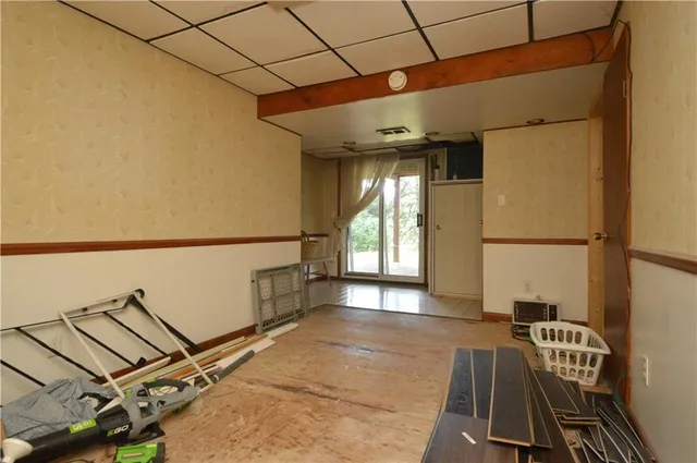a view of entryway with wooden floor