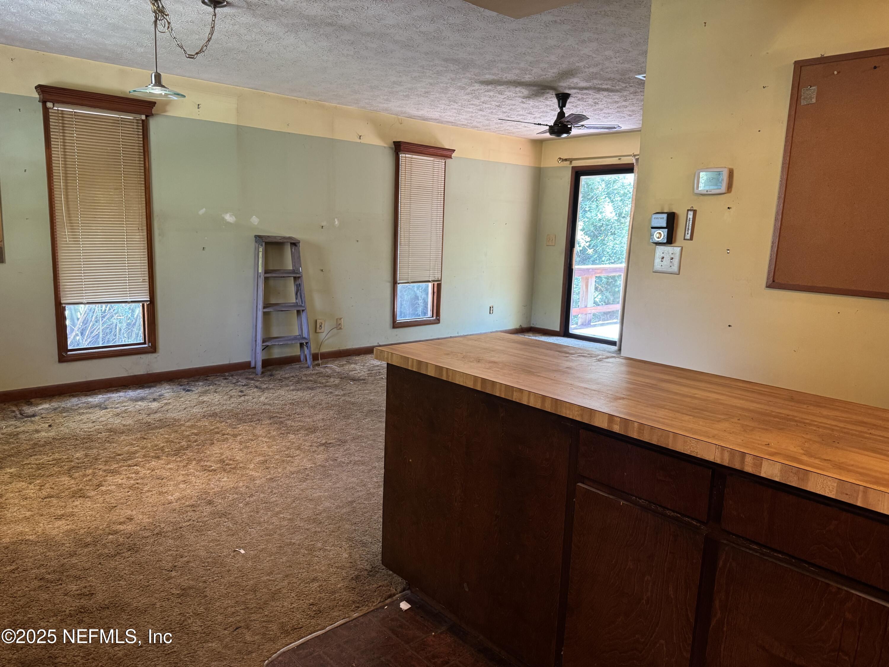 2576 Leon Road Jacksonville, FL 32246 - Photo 6 of 22 Kitchen to living