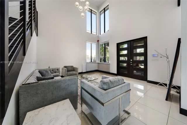 a living room with furniture and a rug