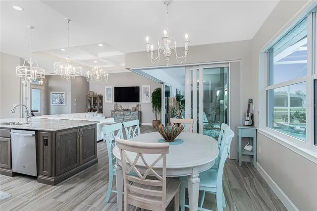 a spacious bathroom with a granite countertop sink and a mirror