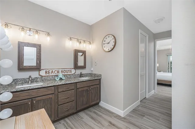 a view of a backyard with swimming pool