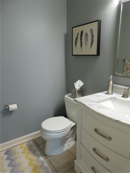 6 Castle View Drive McKees Rocks, PA 15136 - Photo 14 of 25 Main level 1/2 bath boasts neutral colors and large marble vanity.
