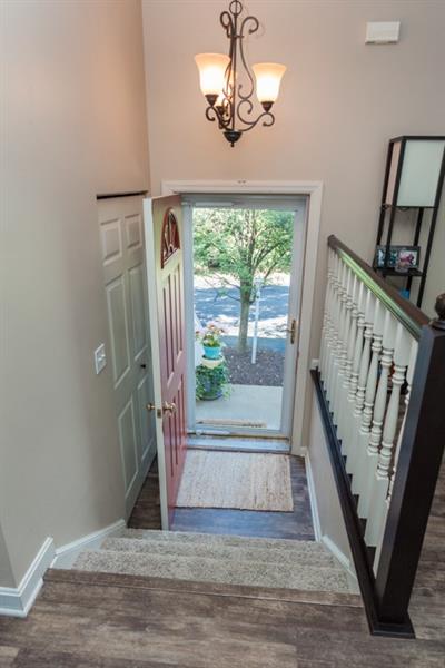 6 Castle View Drive McKees Rocks, PA 15136 - Photo 3 of 25 A welcoming and striking main entrance that makes a statement with dark woodwork, neutral colors and new flooring.
