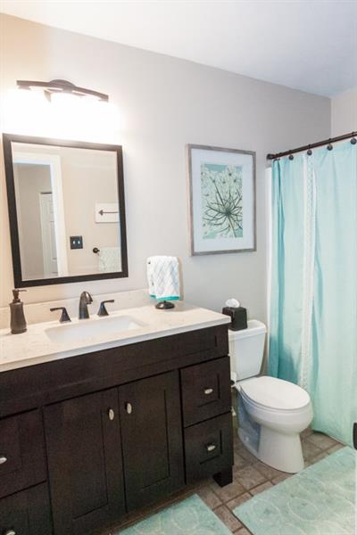 6 Castle View Drive McKees Rocks, PA 15136 - Photo 22 of 25 The master bathroom with updated marble vanity.