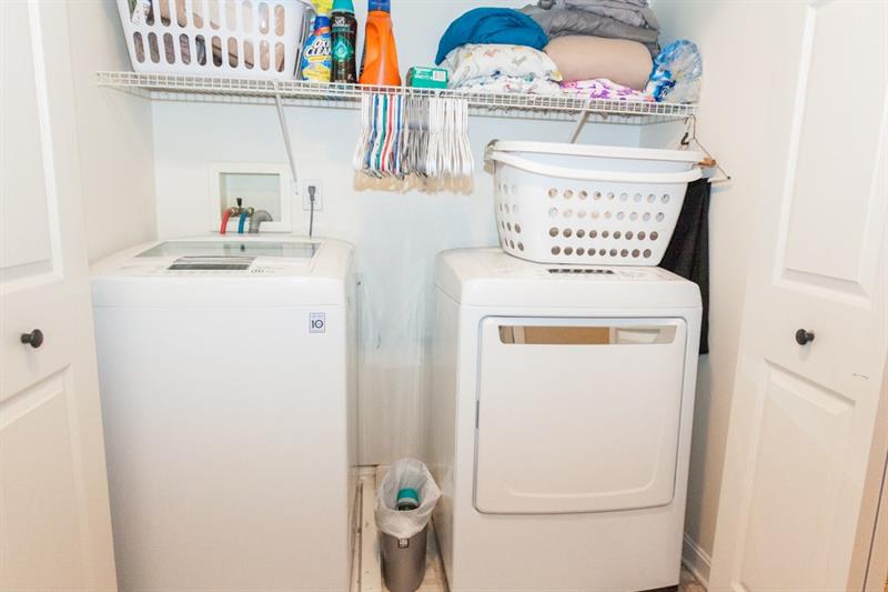 6 Castle View Drive McKees Rocks, PA 15136 - Photo 23 of 25 Cunningly disguised here is the laundry area; large enough to accommodate a washer and dryer, and built-in shelving for your laundry supplies!