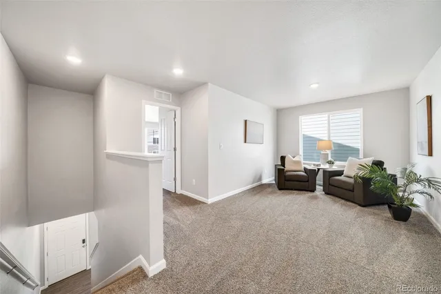 a view of livingroom with furniture and windows