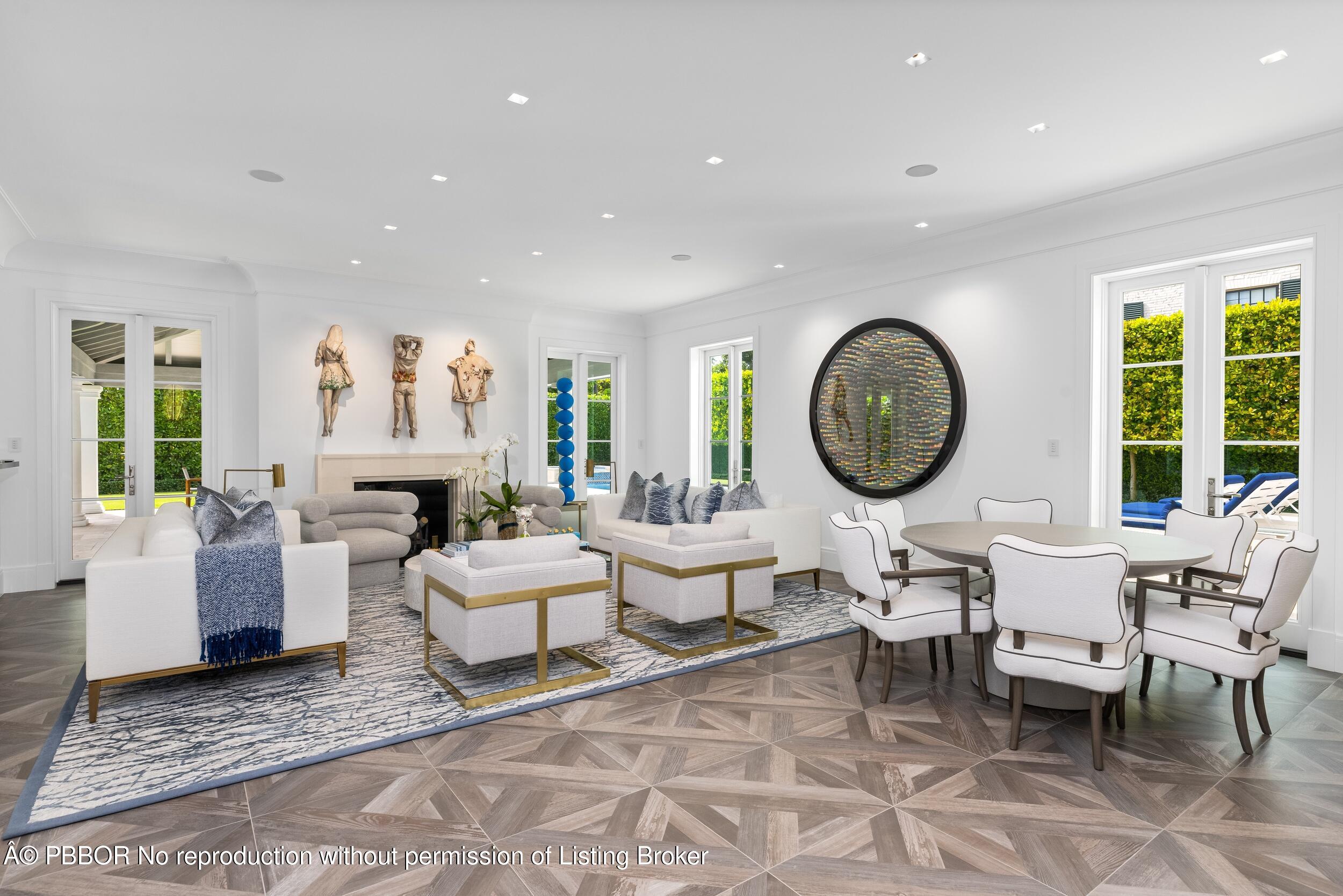 201 Banyan Road Palm Beach, FL 33480 - Photo 6 of 42 a living room with fireplace furniture and a large window
