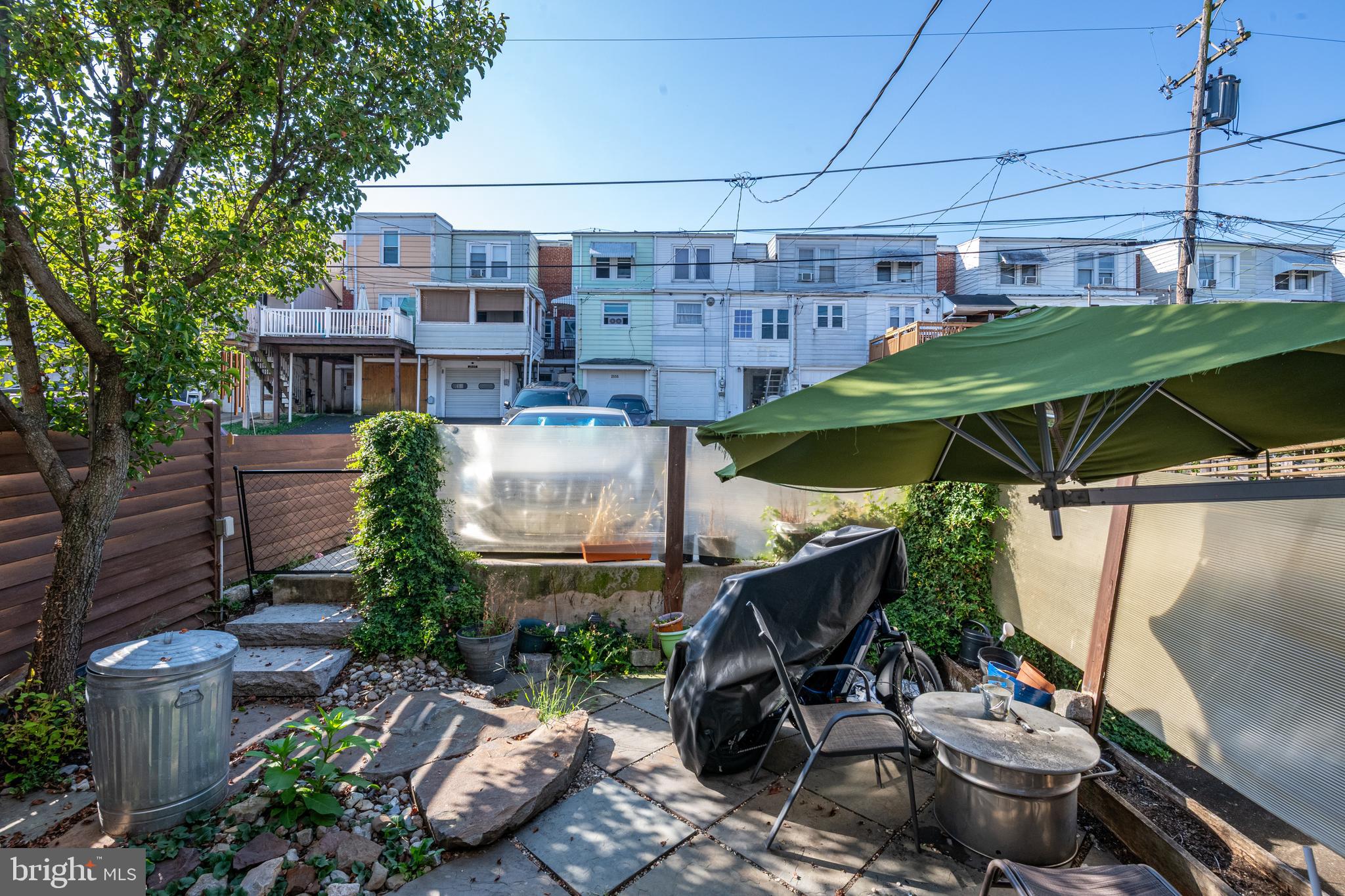 2550 Grant Street Reading, PA 19606 - Photo 17 of 18 a view of a patio with table and chairs potted plants