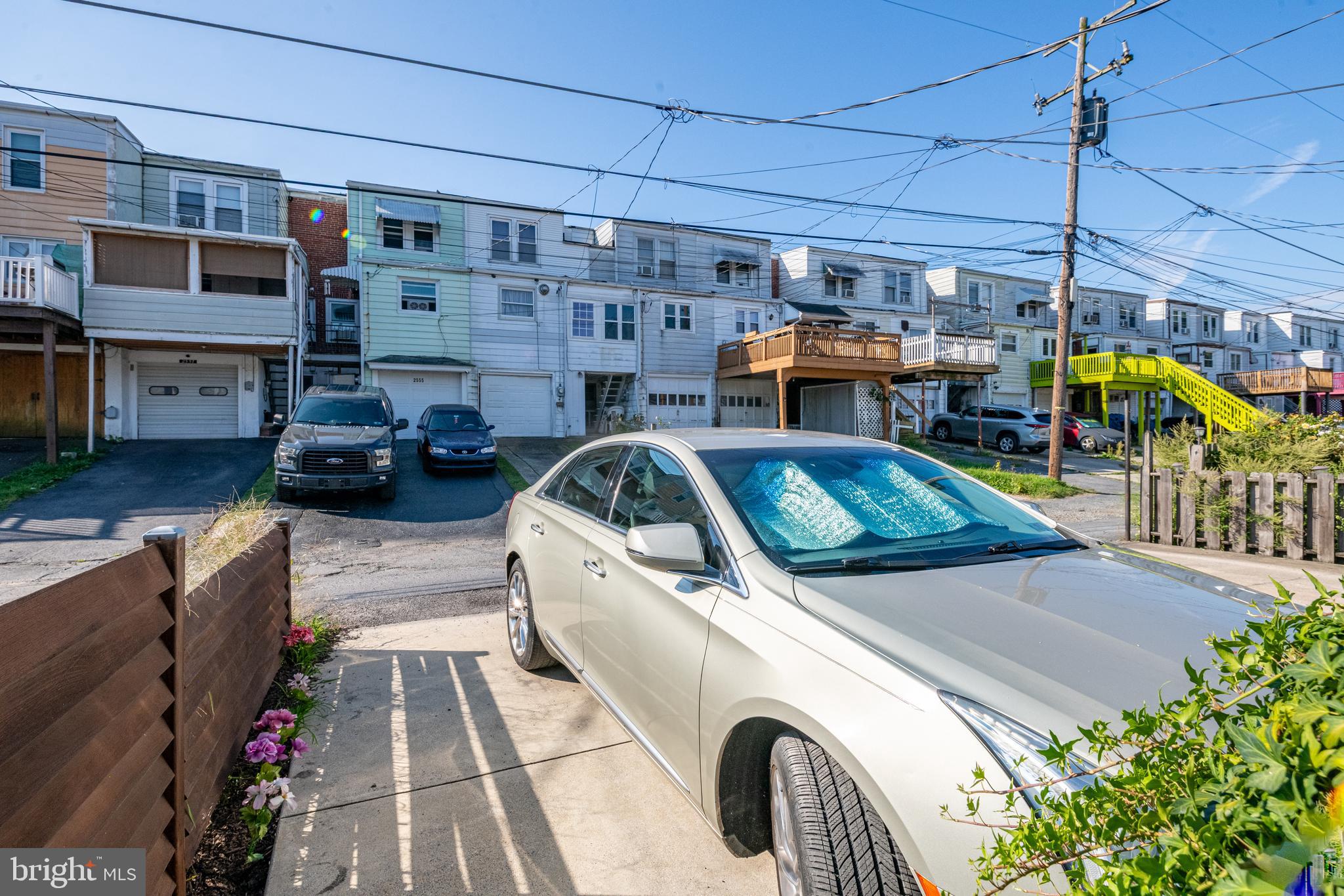 2550 Grant Street Reading, PA 19606 - Photo 18 of 18 a view of a patio with table and chairs potted plants