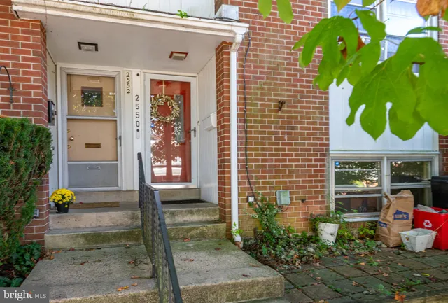 a front view of a house with outdoor space