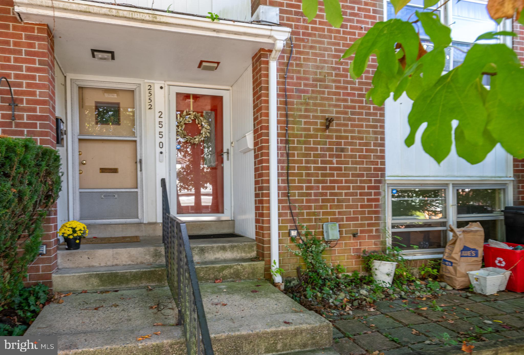 2550 Grant Street Reading, PA 19606 - Photo 2 of 18 a front view of a house with outdoor space