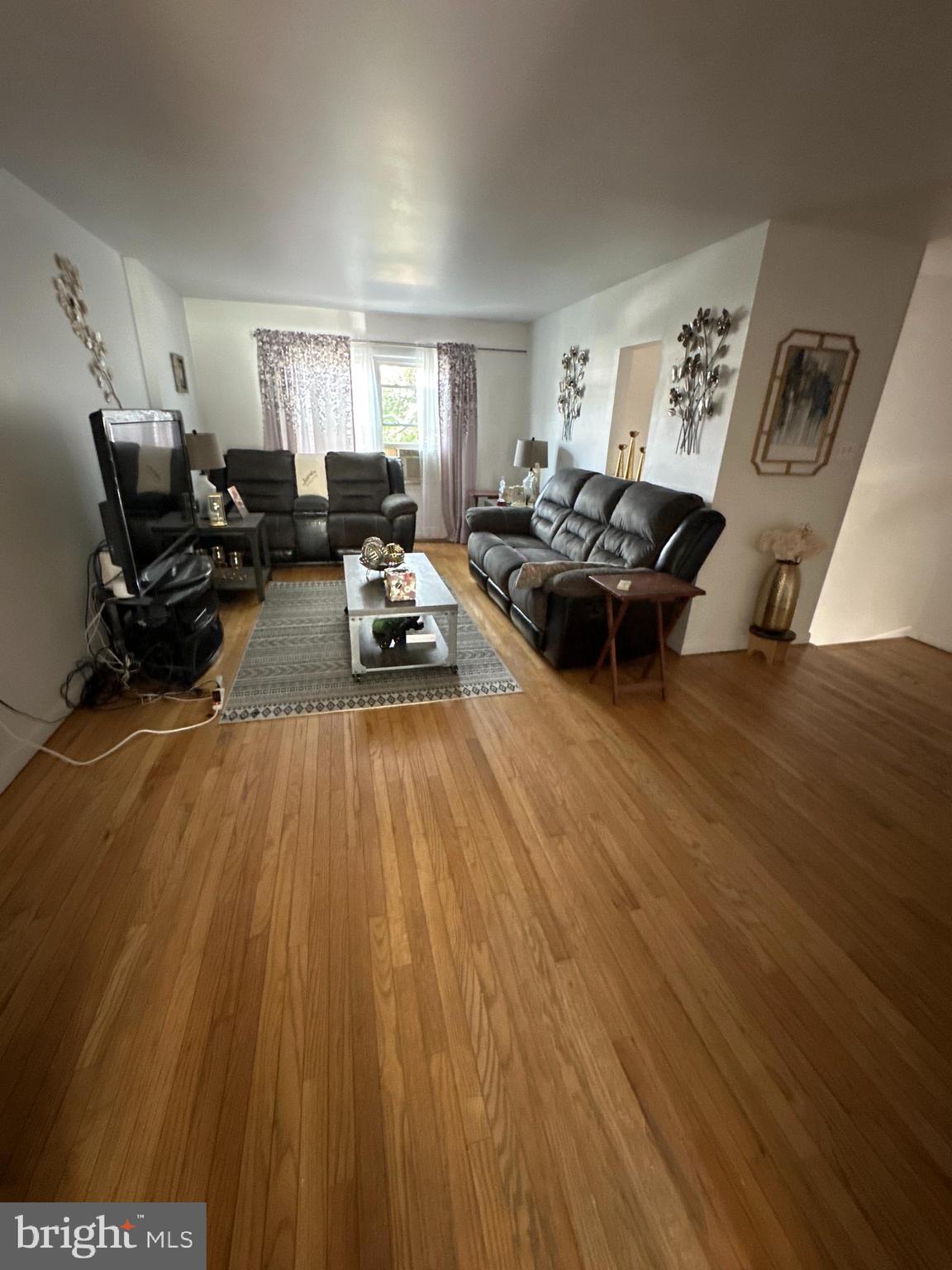 2550 Grant Street Reading, PA 19606 - Photo 6 of 18 a living room with furniture and a wooden floor