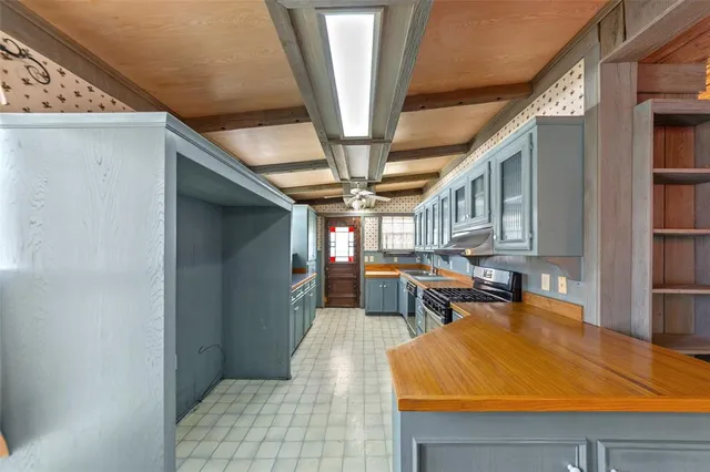 a view of kitchen with furniture and window
