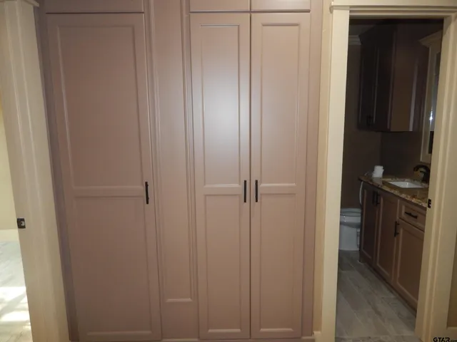 a view of a kitchen from the hallway