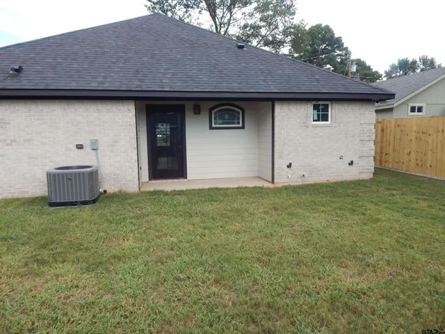 a house view with a garden space