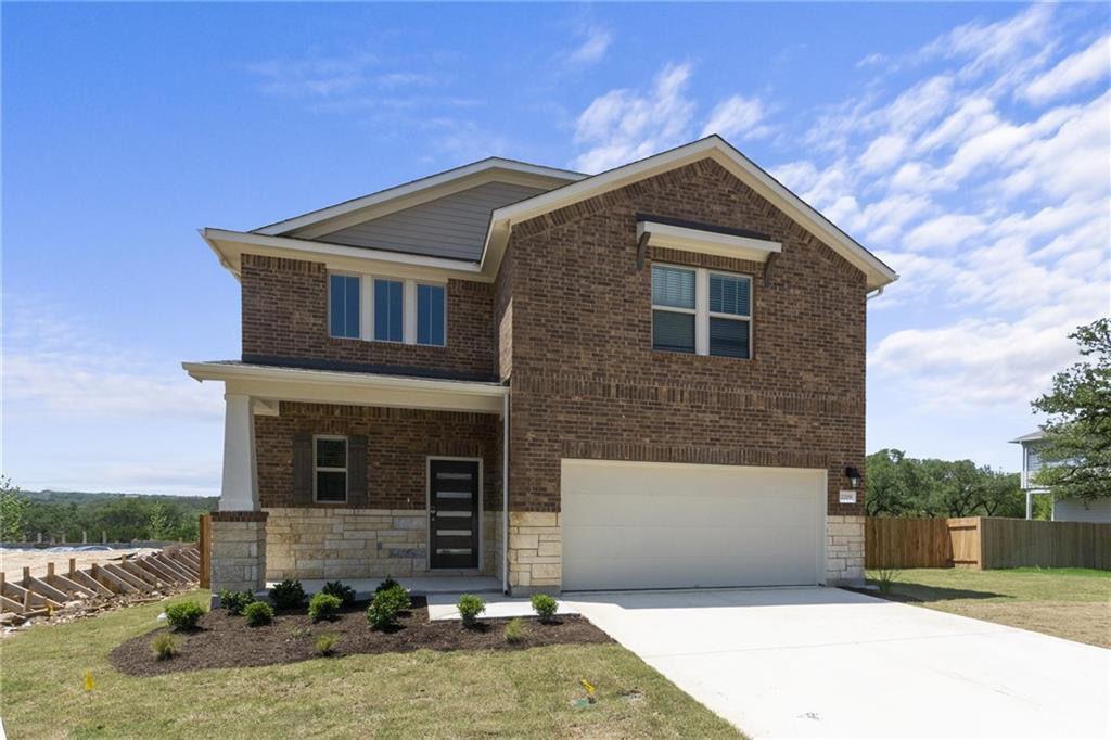2209 Limestone Lake Drive, Unit 39 Georgetown, TX 78633 - Photo 1 of 1 a front view of a house with a yard