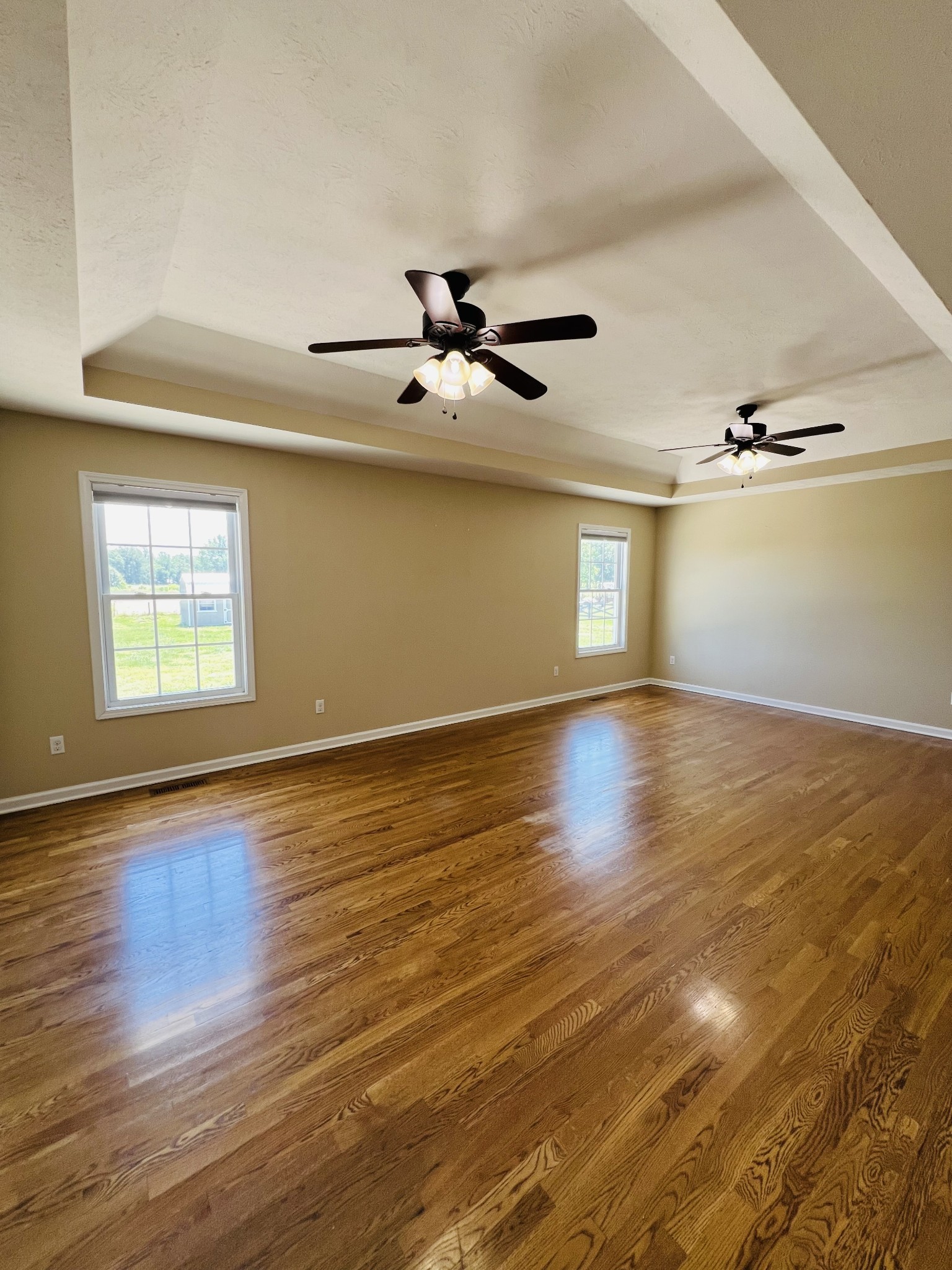 663 Jackson Road Portland, TN 37148 - Photo 18 of 32 a view of empty room with wooden floor and fan